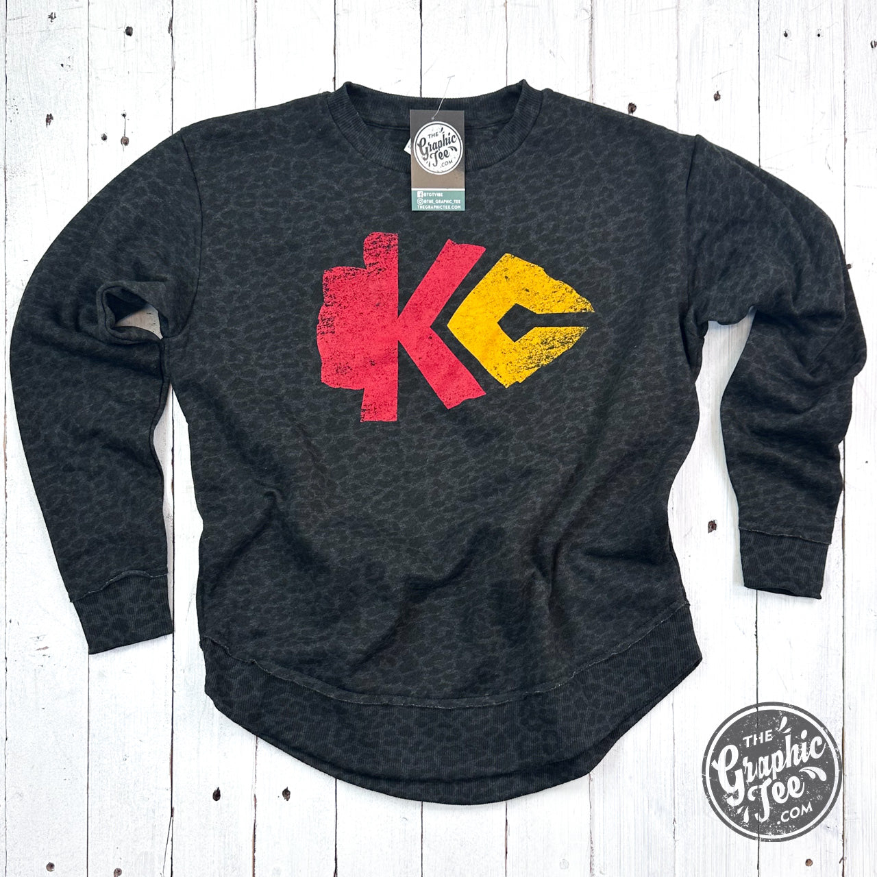 *WHOLESALE* KC Arrowhead Black Leopard Women's Curved Hem Crewneck Sweatshirt